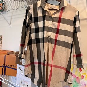 XL Burberry plaid half button shirt. Has a small green paint stain on the front